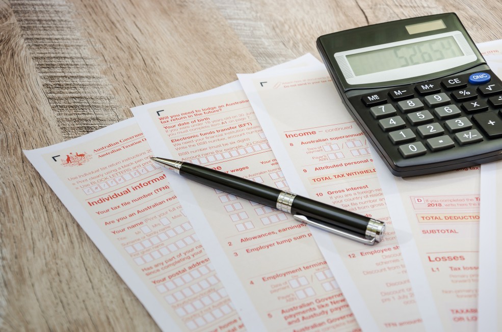 Australian Tax Return For Individuals Form a Calculator and Pen